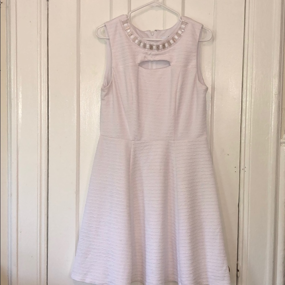 White Pleated Dress with a Round Neck